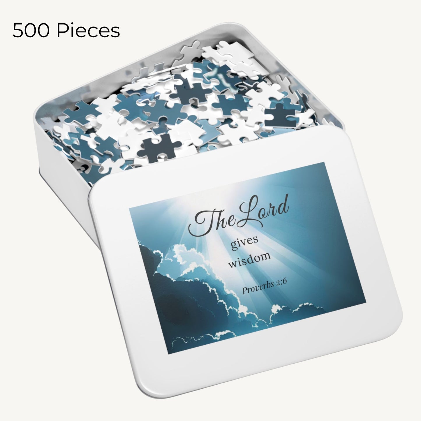 Jigsaw puzzle set with 500 pieces in a tin box featuring a religious quote.