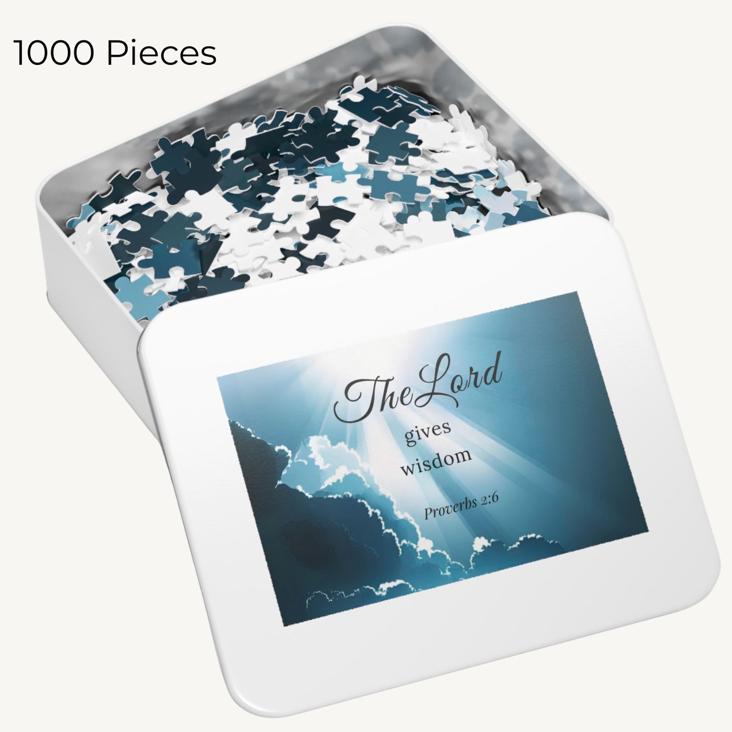 Jigsaw puzzle with 1000 pieces in a tin box featuring a motivational quote.