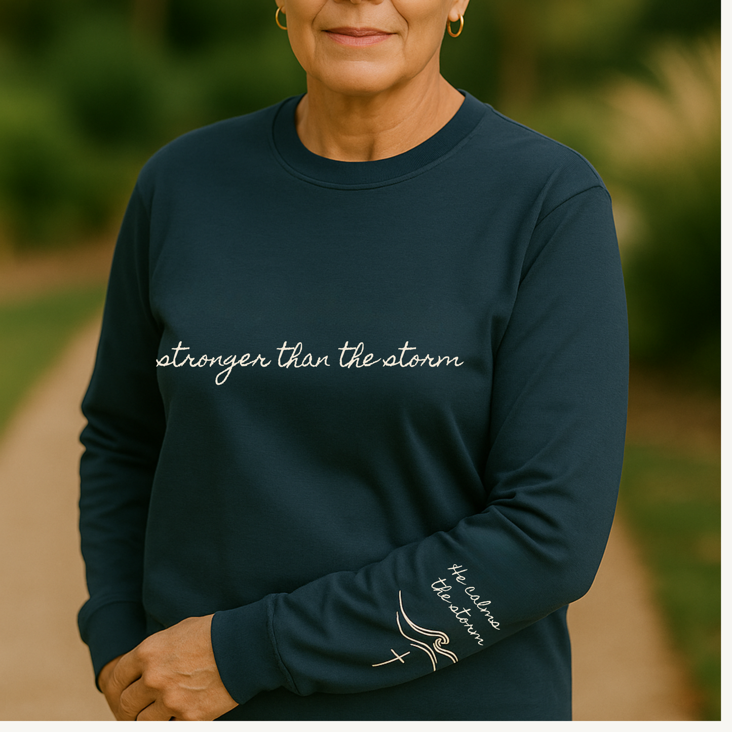 Stronger Than the Storm Christian Tee – “He Calms the Storm” Sleeve Design – Faith Shirt for Women – Inspirational Scripture Shirt – Comfort Colors Style - Heavenly Treasures