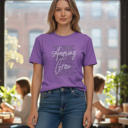 Woman wearing a purple t-shirt with text in a casual setting
